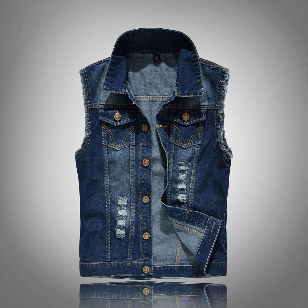 Front view of a dark blue distressed denim vest with frayed armholes and flap pockets