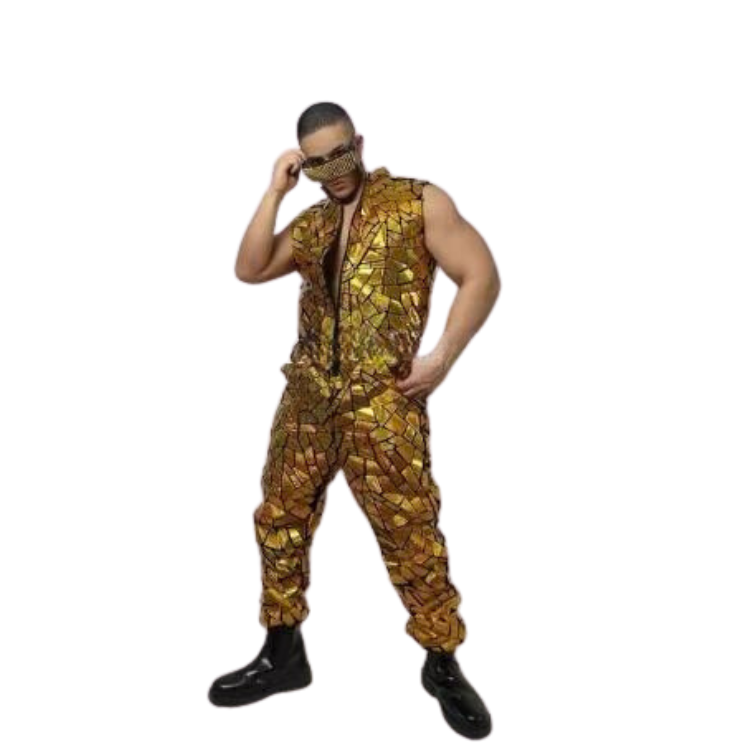Front-view model wearing a gold mosaic-print sleeveless jumpsuit with black boots and visor
