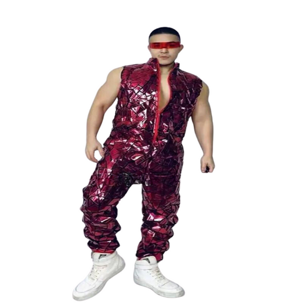 Front-facing model in a burgundy reflective geometric jumpsuit with red visor sunglasses and white high-tops