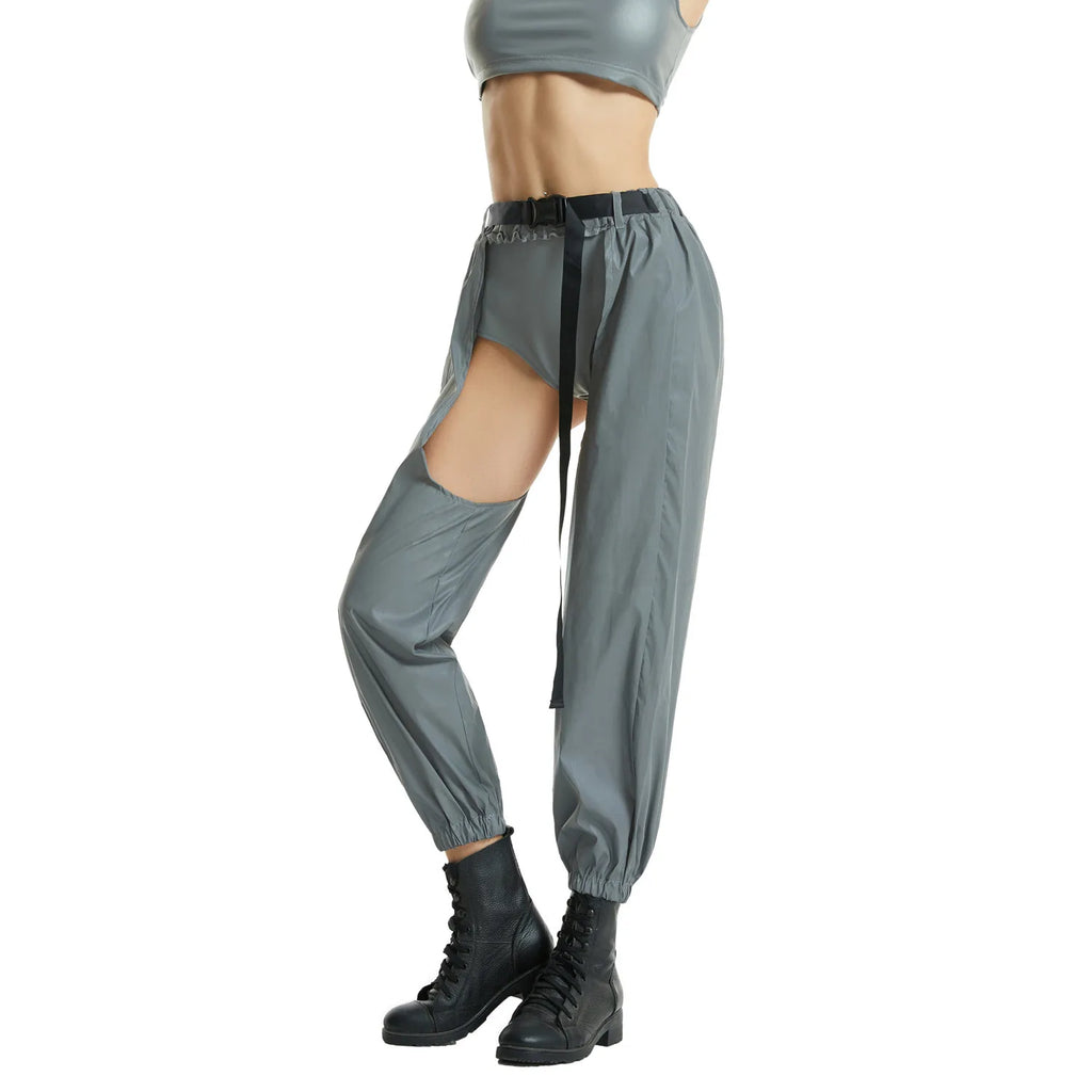 Side view of a model wearing gray reflective cargo pants with a large thigh cutout and black belt
