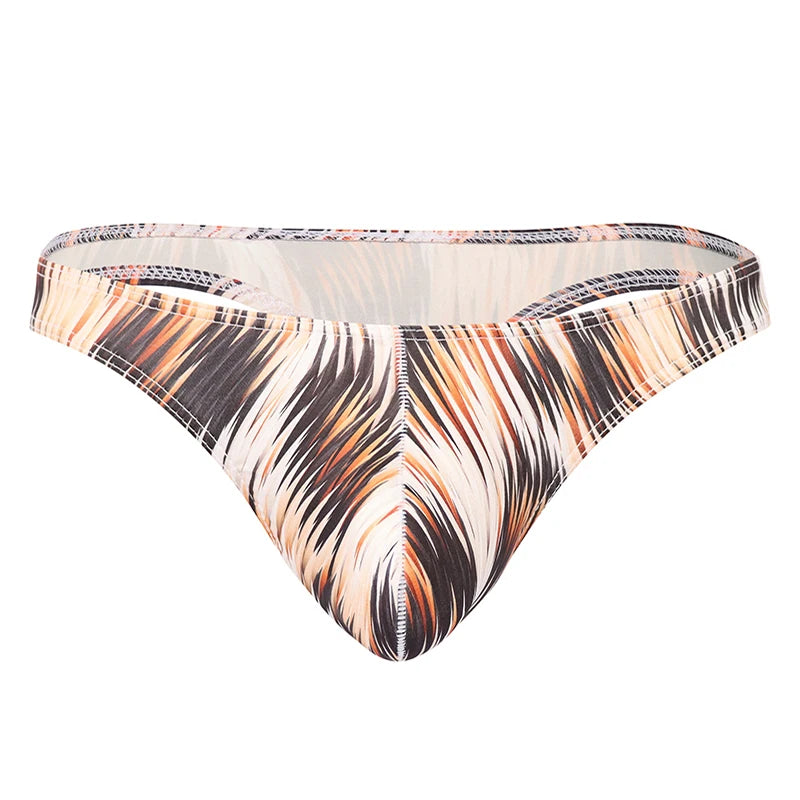Front view of low-rise brief underwear with an abstract black, white, and orange feather-like print