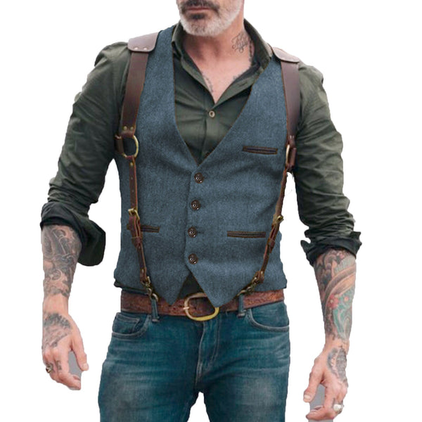 Front view of a blue-gray buttoned vest with brown trim and multiple pockets on a model