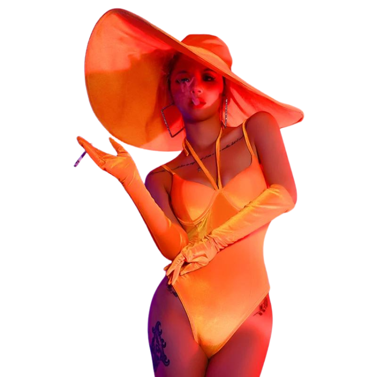 Front-facing model in an orange bodysuit, long gloves, and oversized wide-brim hat
