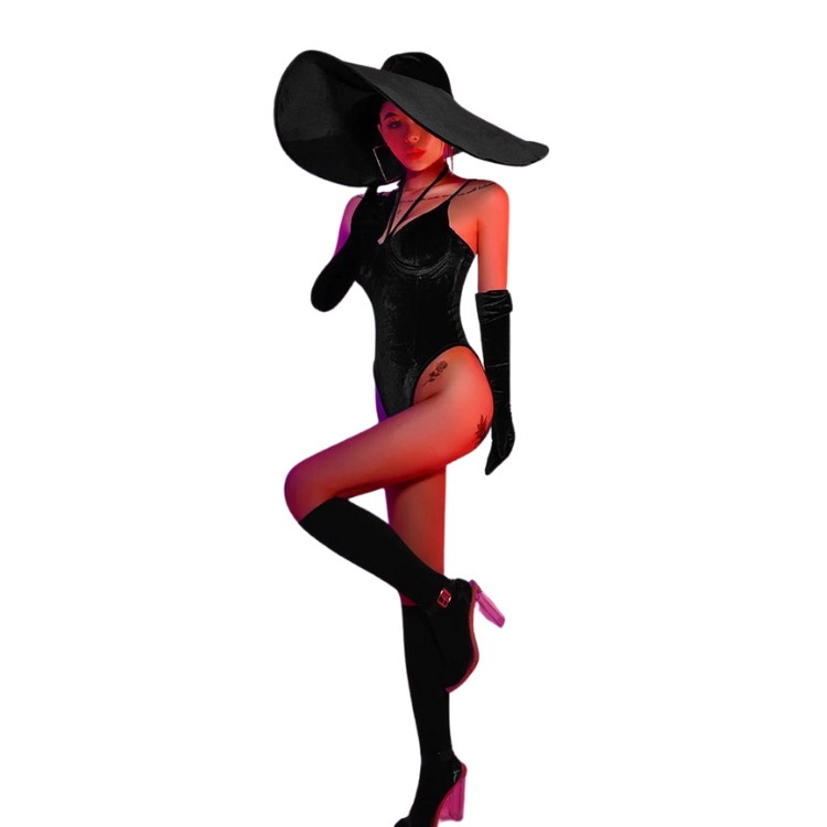 Model in a black velvet bodysuit, wide-brim hat, long gloves, and thigh-high heeled boots