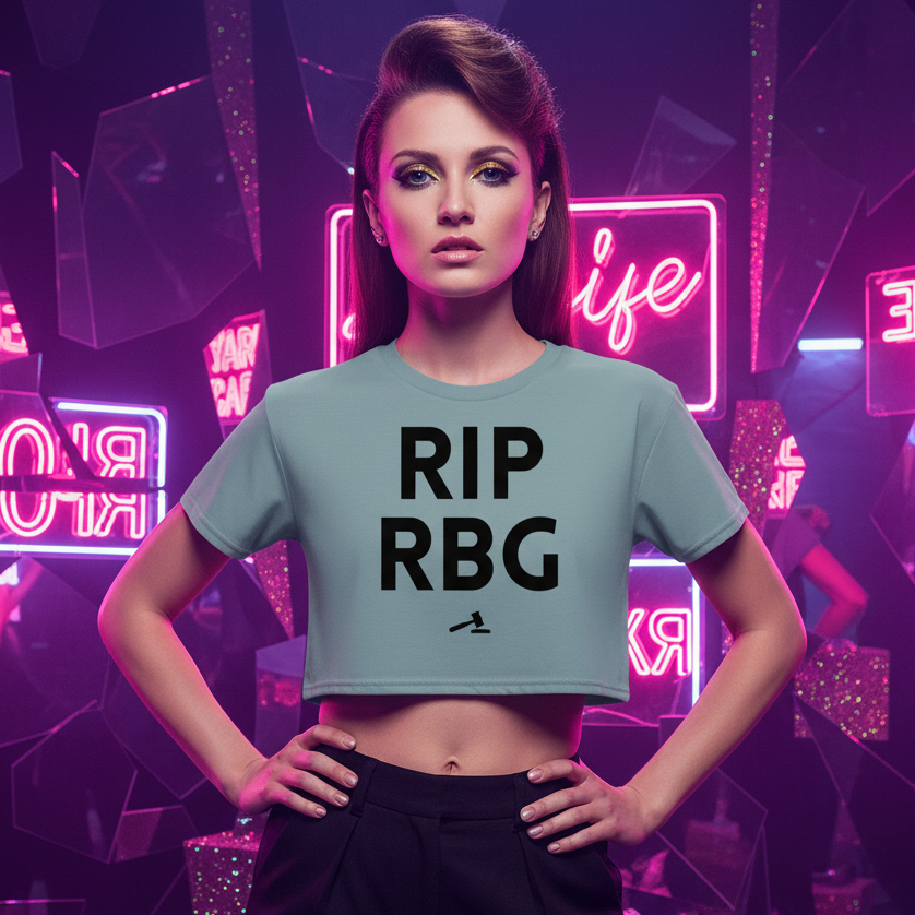 Rip Rbg Crop Top with a small gavel icon, worn by a confident person indoors