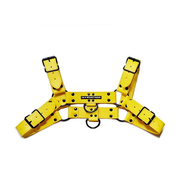 Yellow leather-style harness with adjustable buckled straps and black metal rings, shown flat