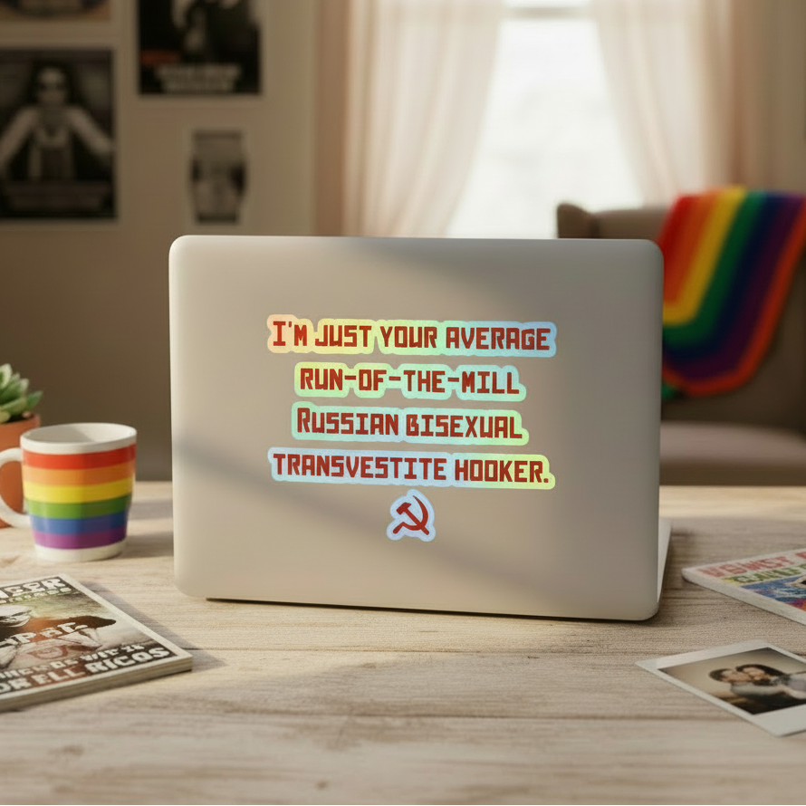 Laptop decorated with “Russian Bisexual Transvestite Hooker” holographic stickers, red hammer and sickle, rainbow mug