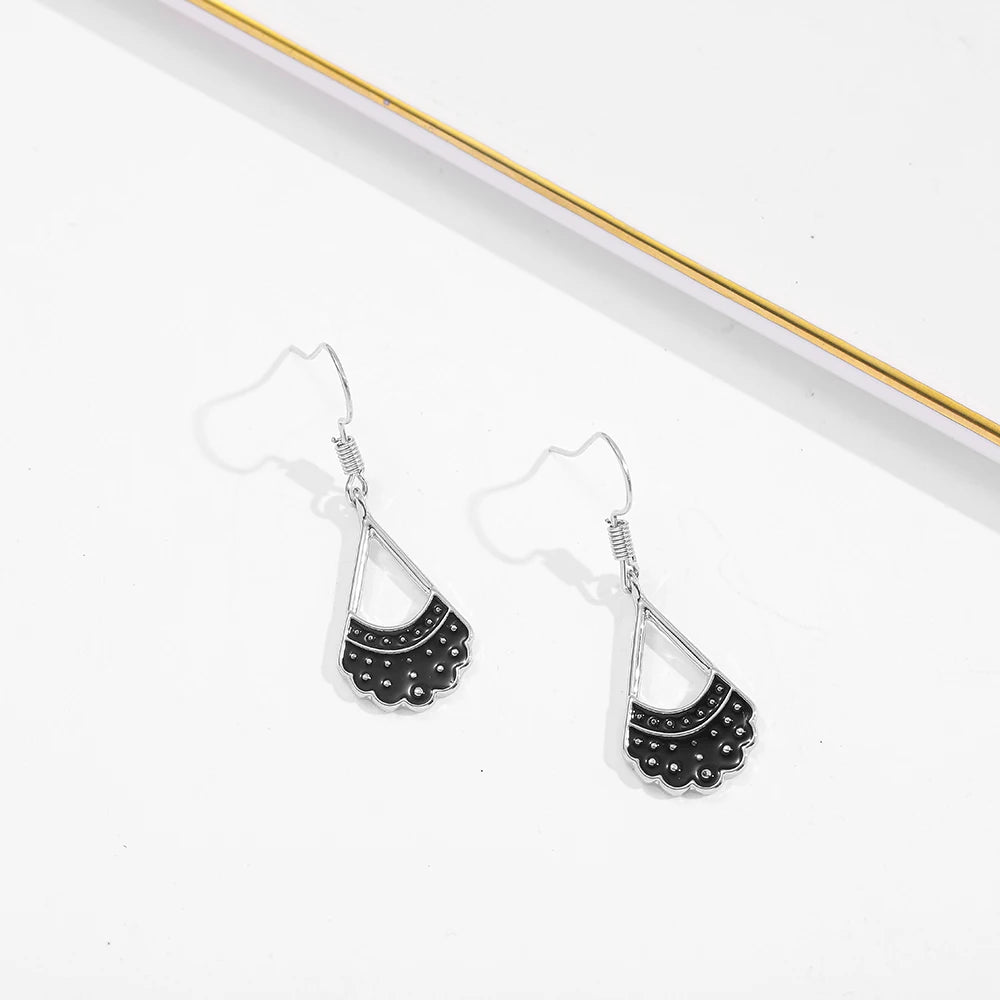 Black scalloped fan drop earrings with silver-tone hooks and studded detailing