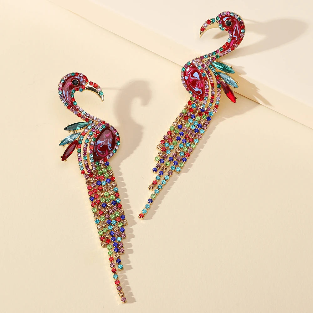 Colorful rhinestone flamingo dangle earrings with long crystal-covered tails