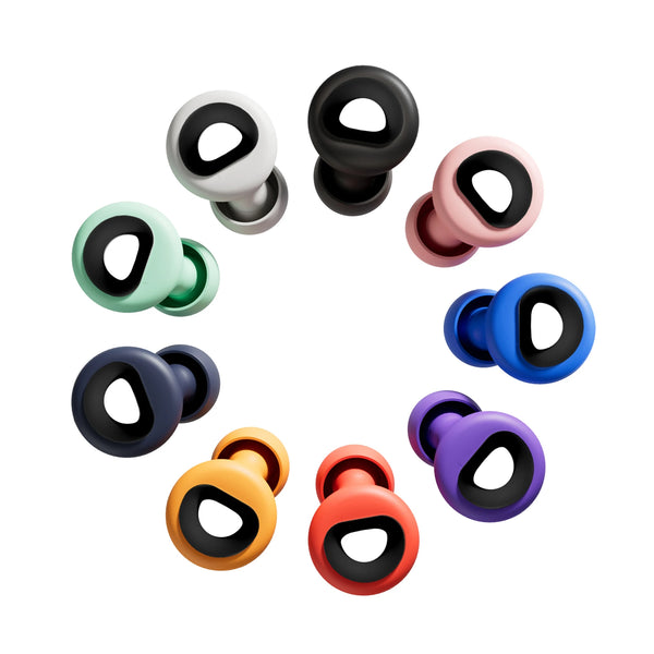 Flat lay of ten colorful silicone earplugs with black teardrop-shaped openings