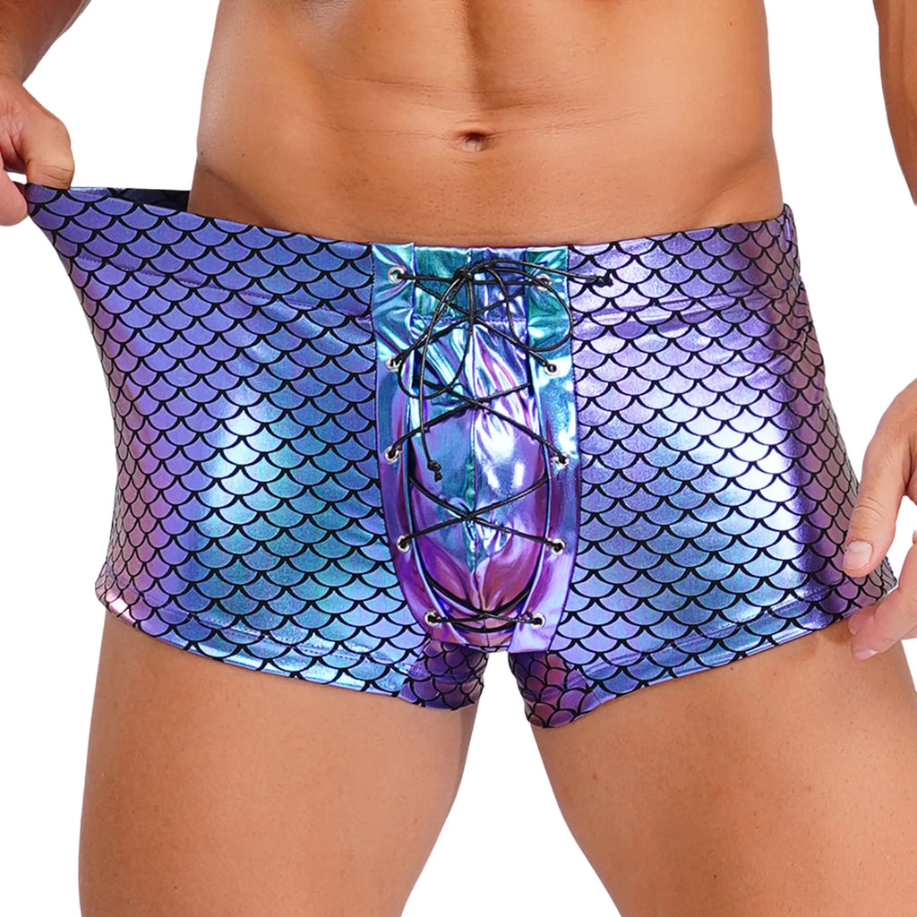 Front view of a model wearing purple holographic mermaid-scale boxers with a lace-up front