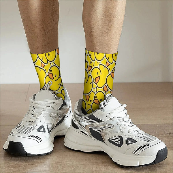 Yellow socks covered in cartoon rubber ducks, shown with white sneakers