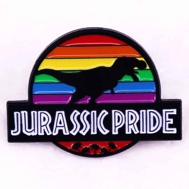 Jurassic Pride enamel pin with a black dinosaur silhouette over rainbow stripes