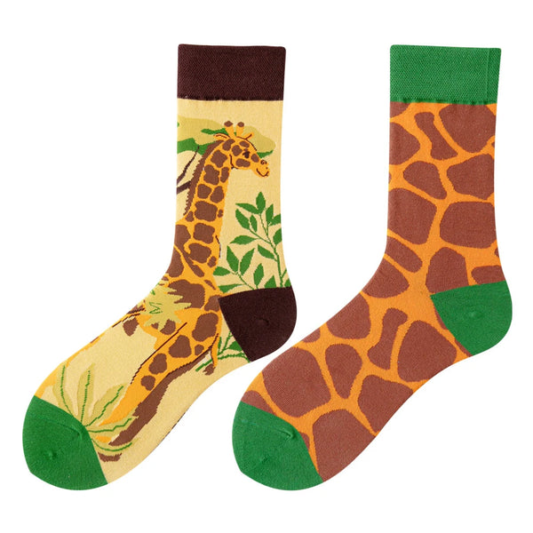 Giraffe-print crew socks with illustrated giraffe, leafy details, and green toes and cuffs