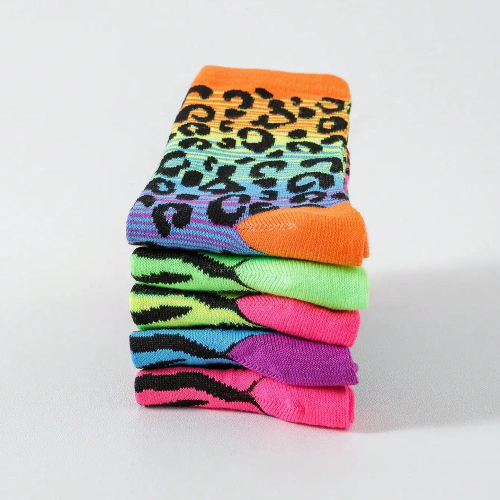 Stack of five colorful ankle socks with black leopard spots and bright toes