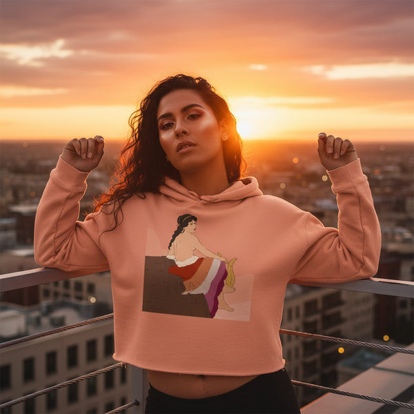Sappho of Lesbos crop hoodie—peach, features a seated person in classical dress and an orange sky