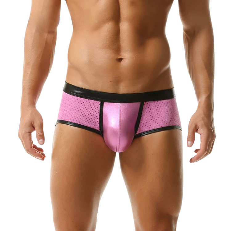 Front view of a model wearing pink mesh boxer briefs with black trim