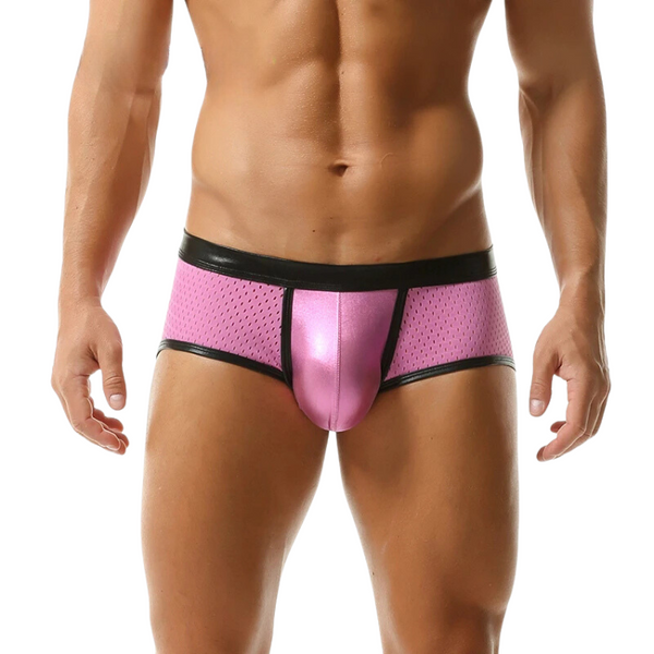 Front view of a model wearing pink mesh boxer briefs with black trim