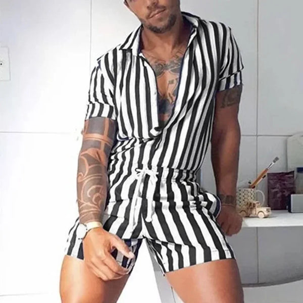 Model wearing a black-and-white striped short-sleeve romper with a drawstring waist