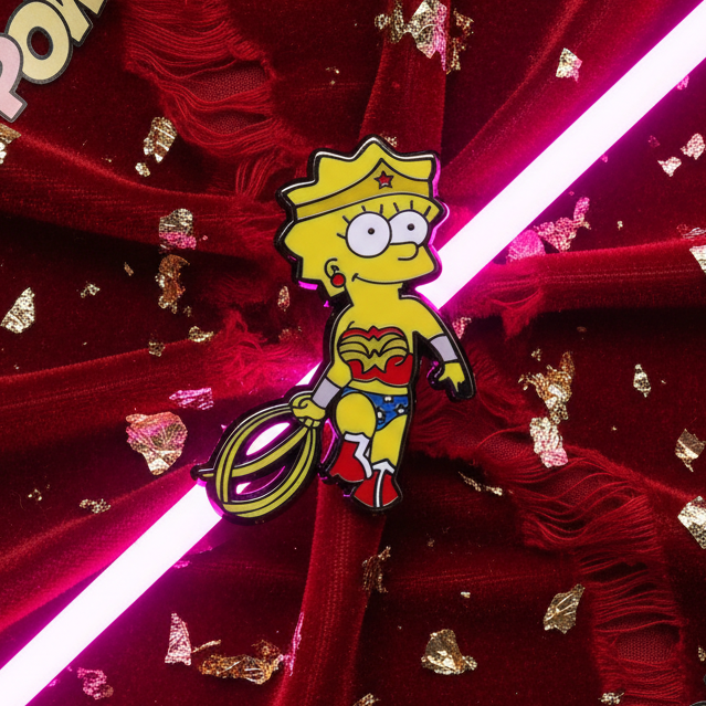 Lisa Simpson Wonder Woman enamel pin with gold lasso on red velvet