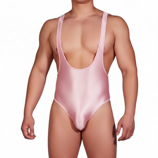 Front view of a model wearing a shiny pale pink U-neck bodysuit