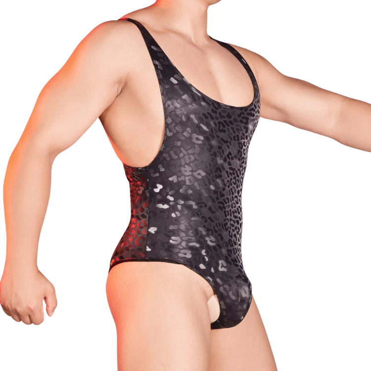 Cropped model wearing a black shiny leopard-print men's bodysuit from the front