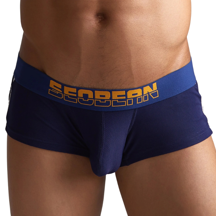 Front close-up of a model wearing navy boxer briefs with a blue waistband and SEOBEAN lettering