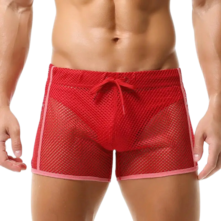 Front view of a model wearing red mesh shorts with pink trim and a drawstring