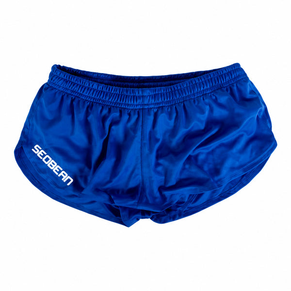 Front view of bright blue short running shorts with an elastic waistband and white Seobean logo