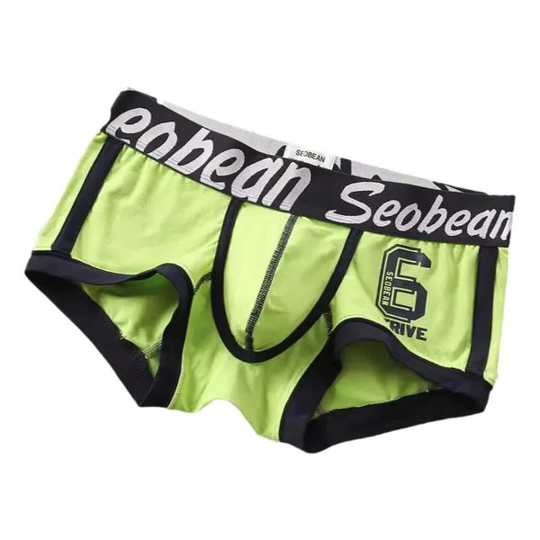 Front three-quarter view of lime green boxer briefs with black trim and Seobean waistband