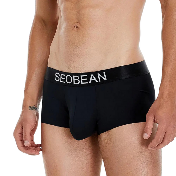 Front view of a model wearing black SEOBEAN boxer briefs with a logo waistband