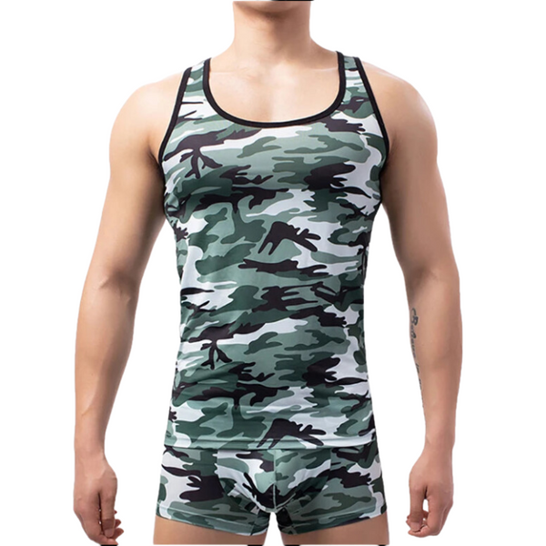 Front view of a model wearing a green camouflage tank top and matching boxer briefs