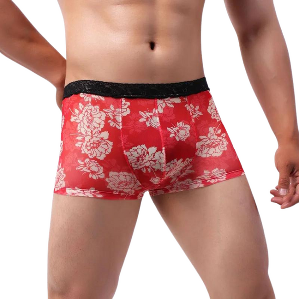 Red boxer briefs with white floral print and black lace-trimmed waistband