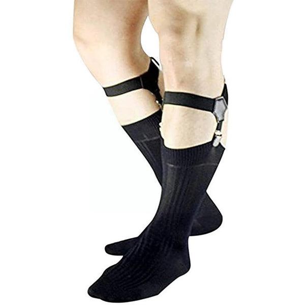 Close-up of legs wearing black knee-high socks held by adjustable garter clips