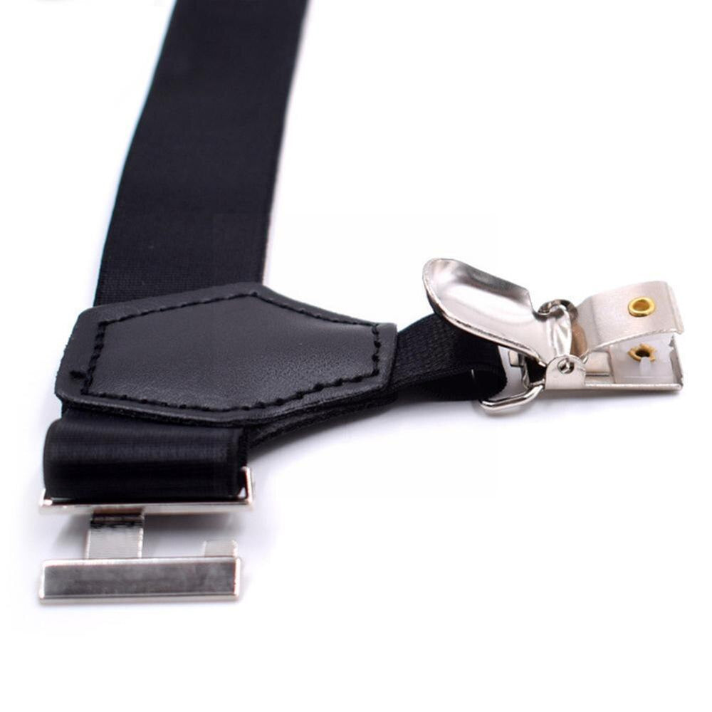 Close-up of a black garter strap with leather tab and silver metal clips