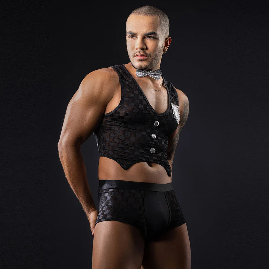 Front-facing model in a black vest, silver bow tie, and matching boxer briefs
