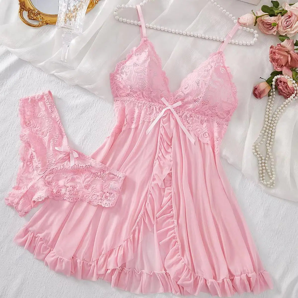 Flat lay of a pink lace babydoll with matching lace panties and ribbon details