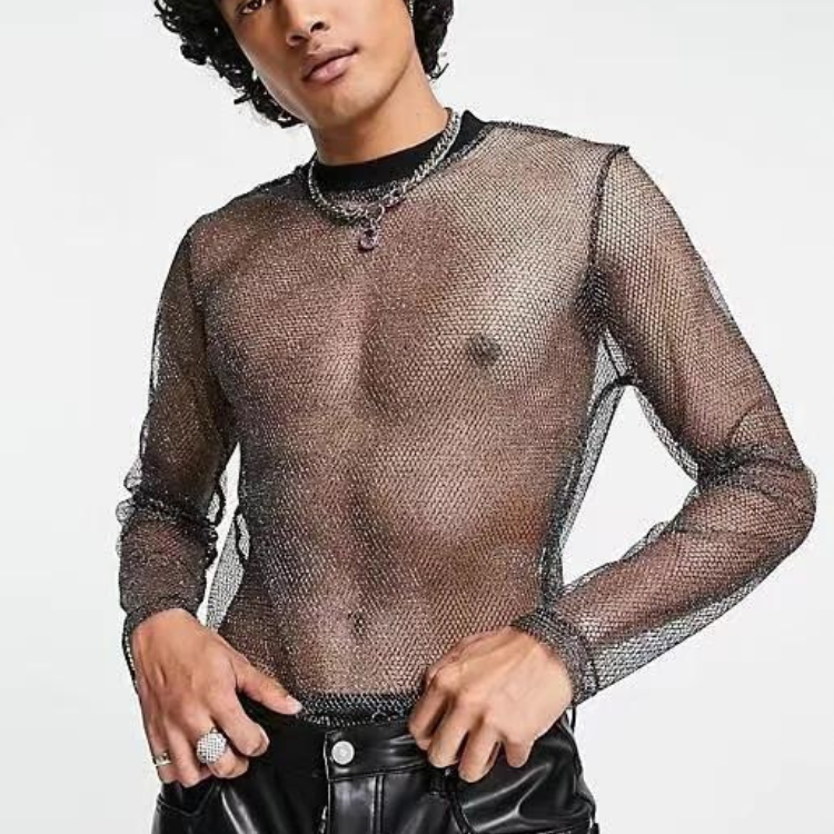Model wearing a sheer black mesh long-sleeve shirt over bare skin