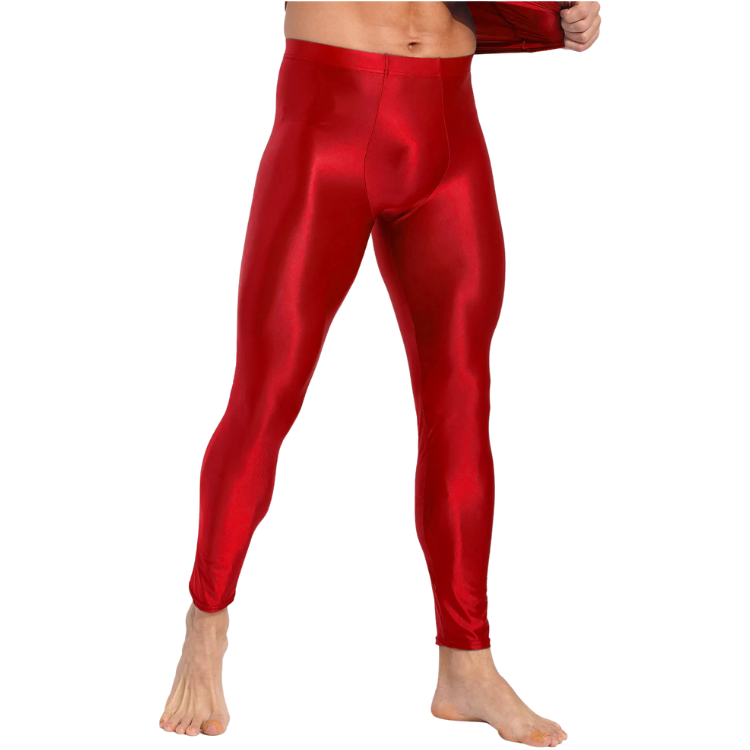 Front view of a model wearing shiny red full-length men's compression leggings