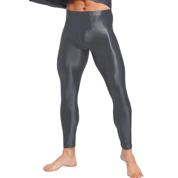Front view of a model wearing shiny black full-length compression leggings