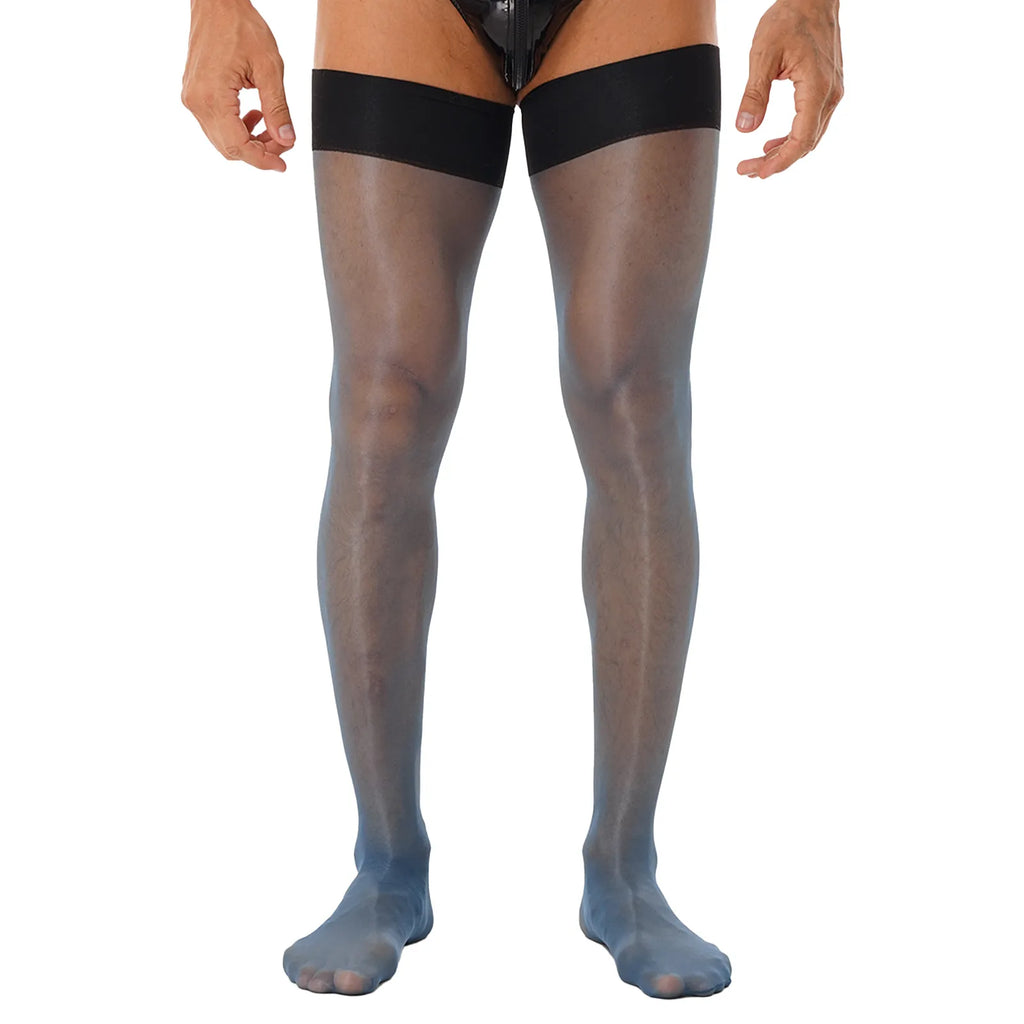 Front view of a model wearing sheer black thigh-high stockings with wide opaque bands