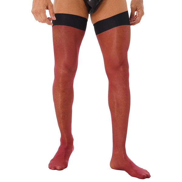 Front view of sheer red thigh-high stockings with wide black bands on a model