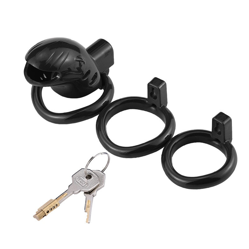 Black silicone chastity cage with two interchangeable rings and two keys