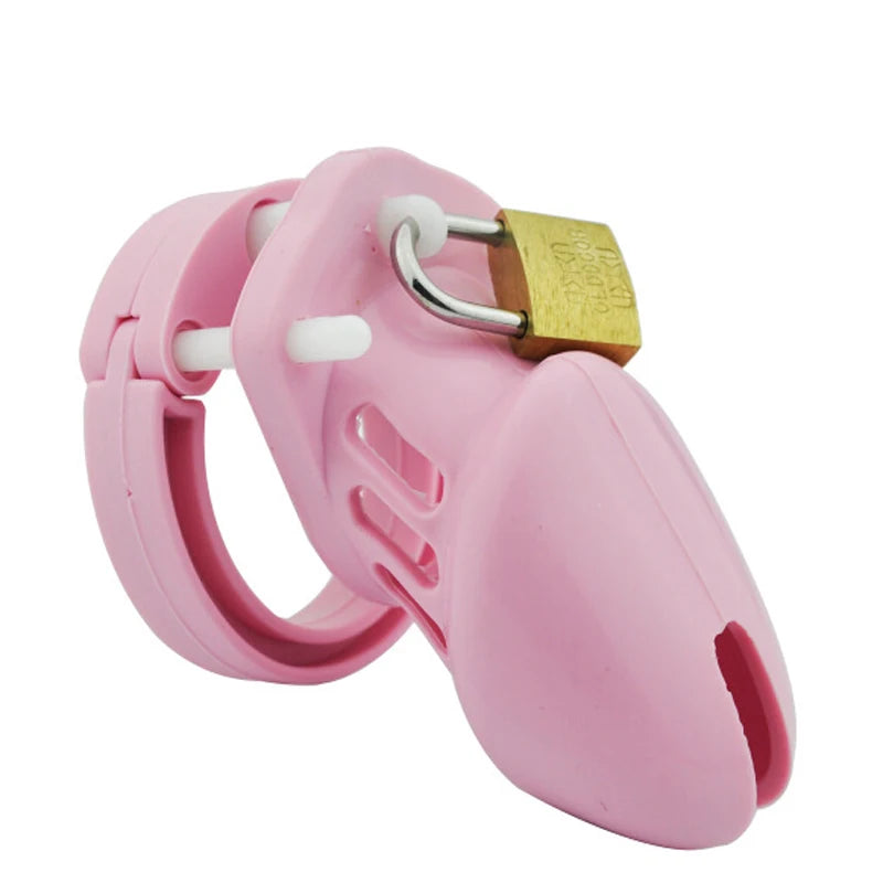 Angled close-up of a pink silicone chastity cage secured with a small brass padlock