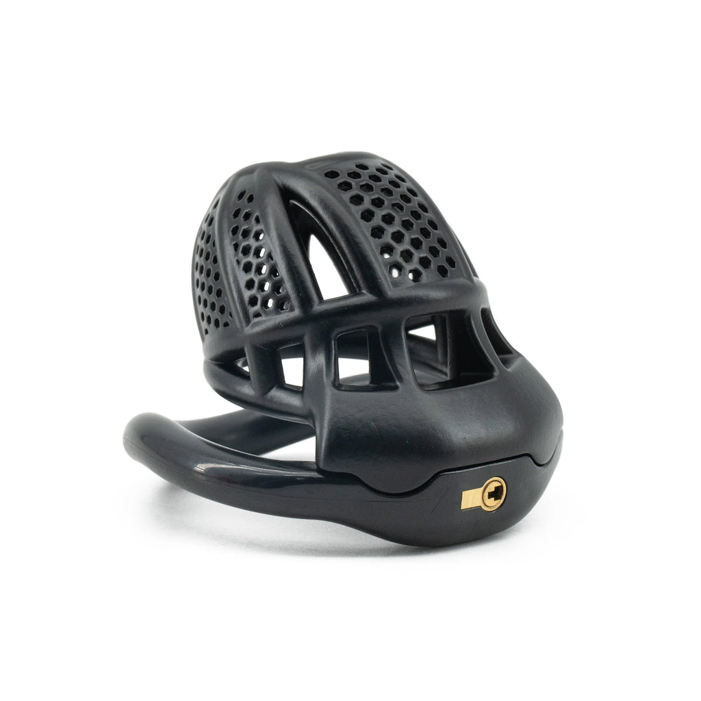 Black ventilated chastity cage with a gold-tone lock, shown at a three-quarter angle