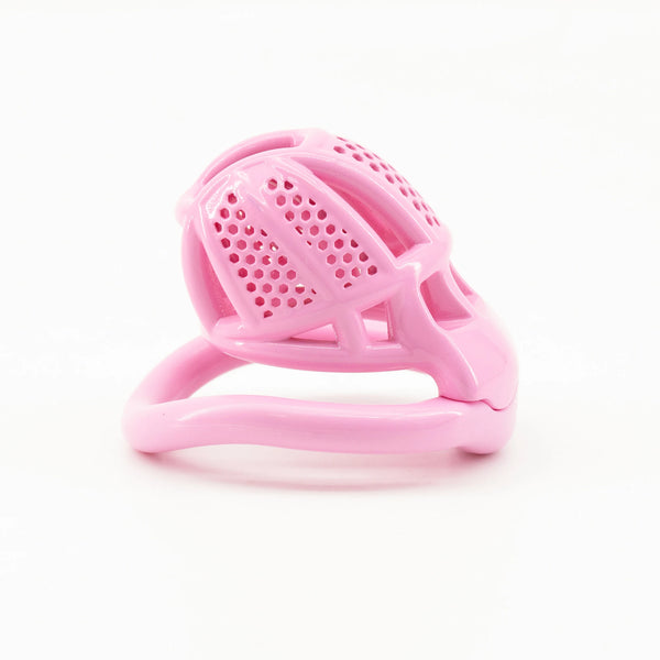 Pink ventilated chastity cage shown at an angled side view on a white background