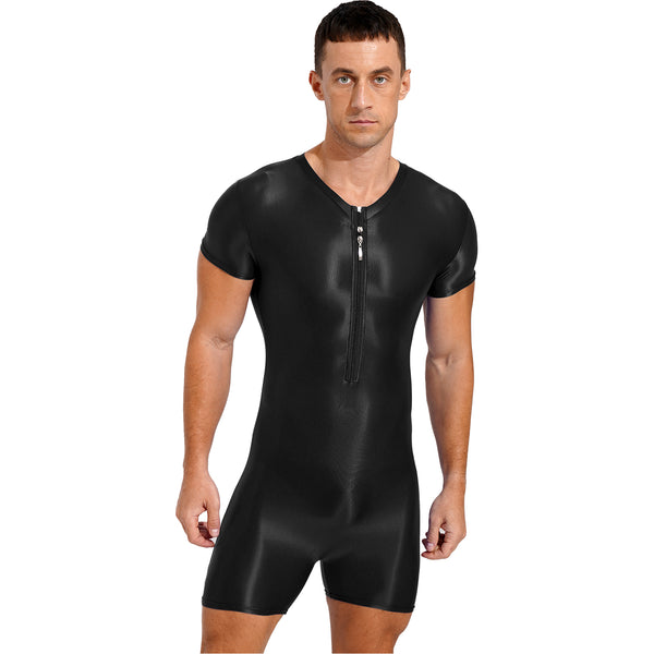 Front-facing model wearing a black short-sleeved zip-front bodysuit