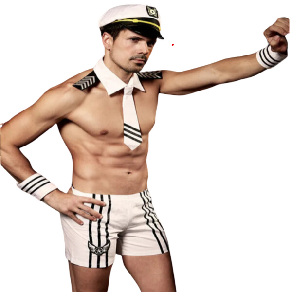 Shirtless person in a white sailor costume with captain's hat, tie, cuffs, and striped shorts