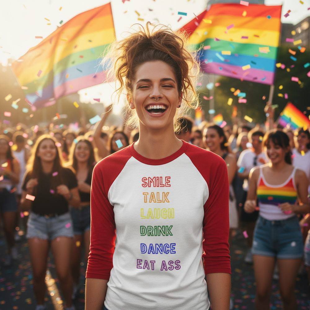Smiling person in a red-sleeve raglan shirt reading “SMILE TALK LAUGH DRINK DANCE EAT ASS”