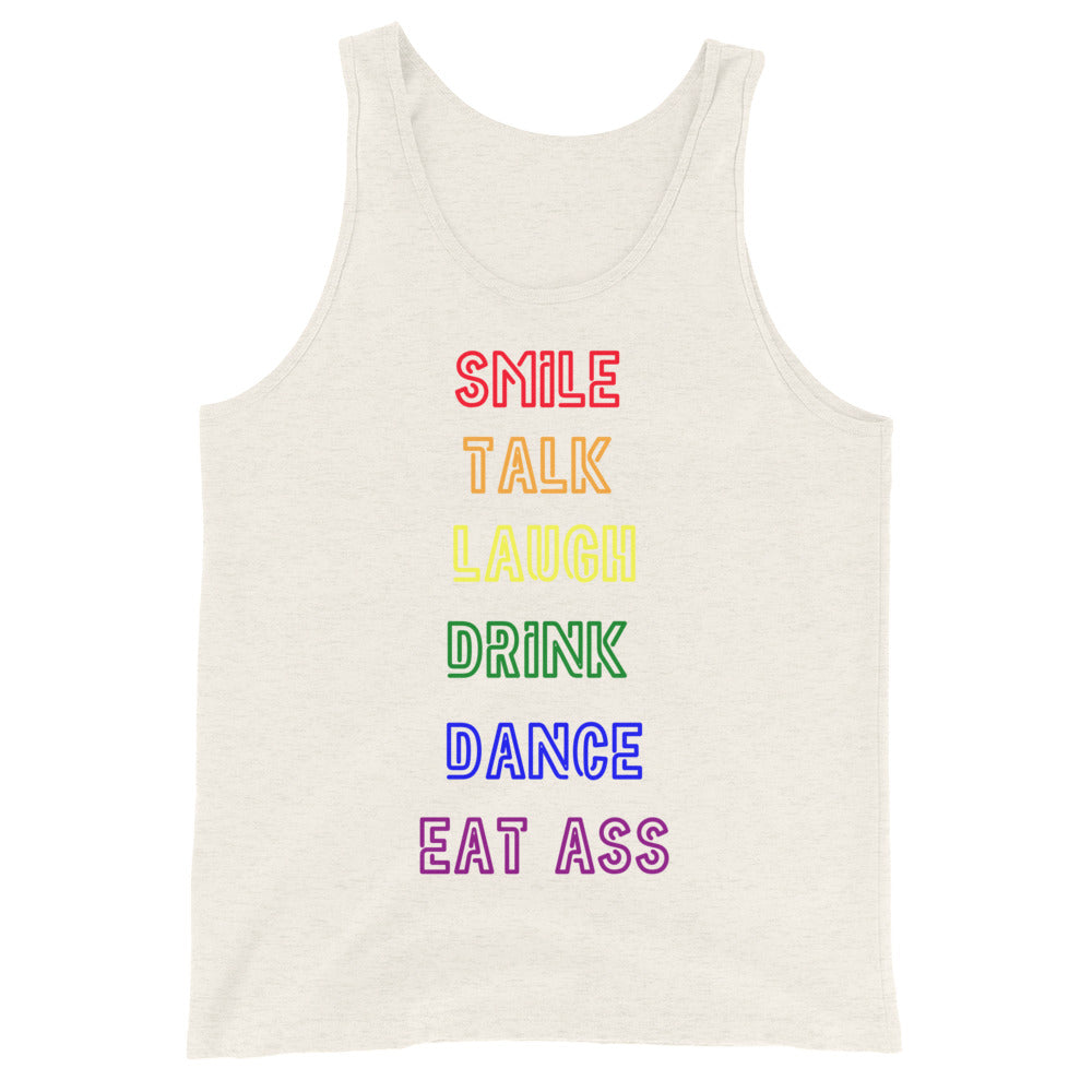 Unisex white tank top with bold block lettering outlined in rainbow, reads “Smile, Talk, Laugh, Drink, Dance, Eat Ass”